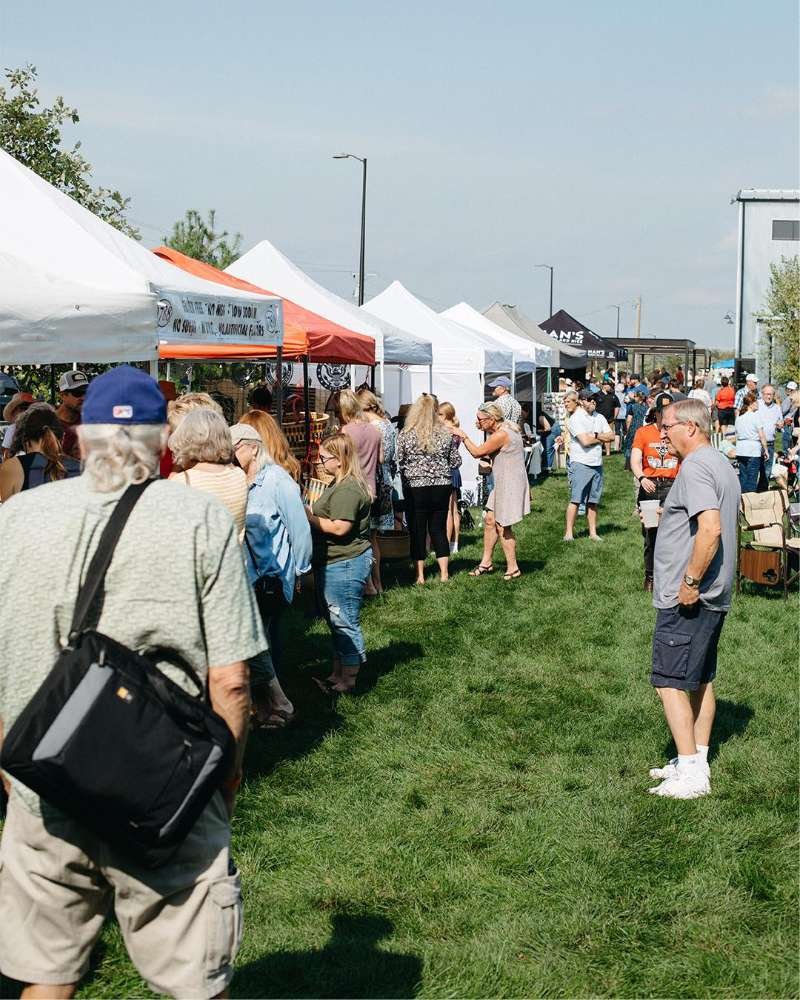 A crowd of people out enjoying the Market at the 45th Farmers Market